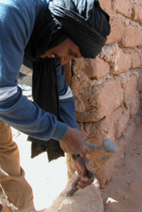 Mohammed showing how he dug the well